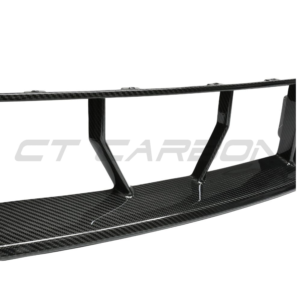 BMW G87 M2 carbon fibre lower grille accessory by CT Carbon, showcasing a sleek, lightweight design for enhanced vehicle style.