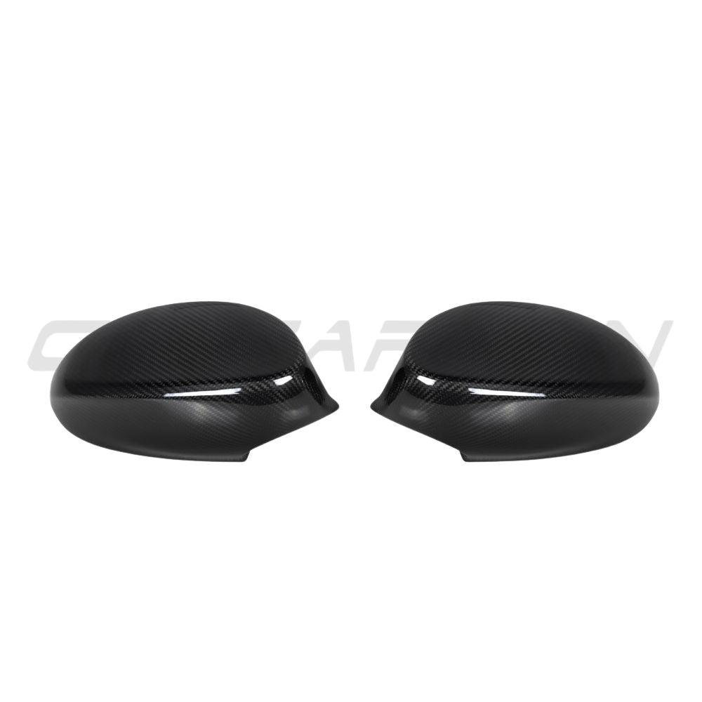 BMW 1 & 3 Series E82/E83/E87/E90/E91/E92/E93 carbon fibre side mirrors by CT Carbon, close-up view of the sleek, aerodynamic design.