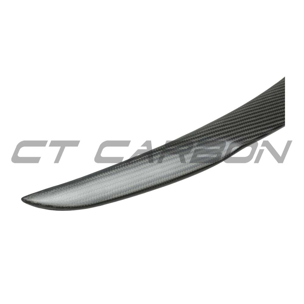 Tesla Model Y 2025+ facelift matte dry carbon spoiler by CT Carbon installed on the rear of the vehicle.