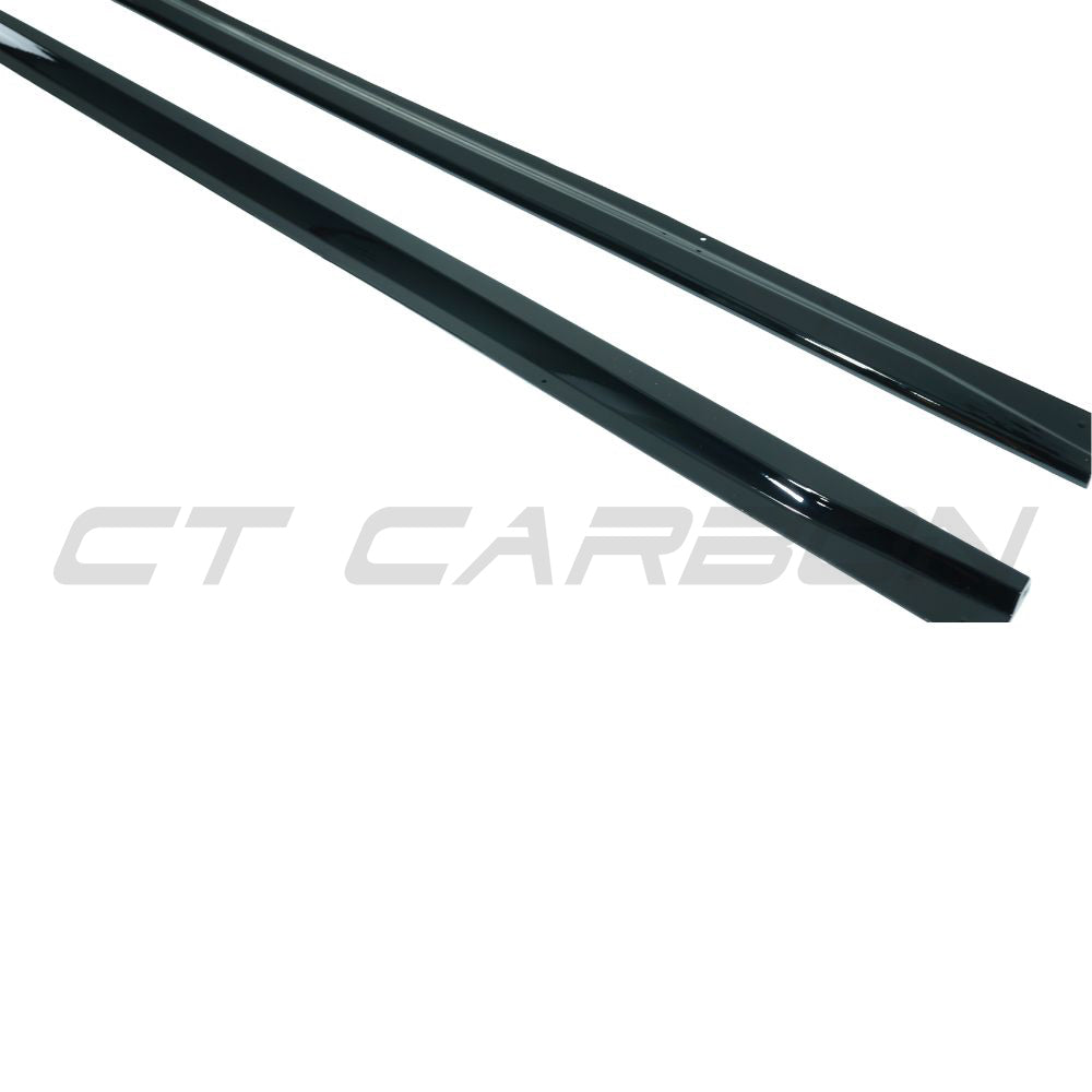 BMW 4 Series G22 G23 side skirts by CT Carbon in gloss black, full length side skirts installed on the vehicle.
