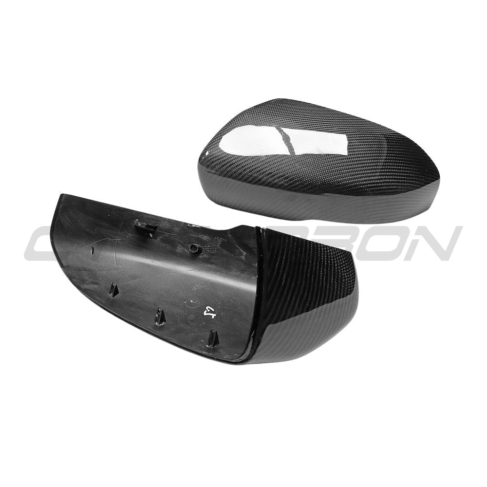 Carbon fibre side mirrors for Land Rover Evoque L538 2012-2013 by CT Carbon, showcasing sleek, lightweight automotive accessories.