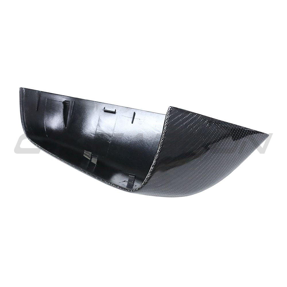 Tesla Model S 2013-2020 carbon fibre mirror covers by CT Carbon, close-up of sleek, textured carbon fibre exterior accessories.