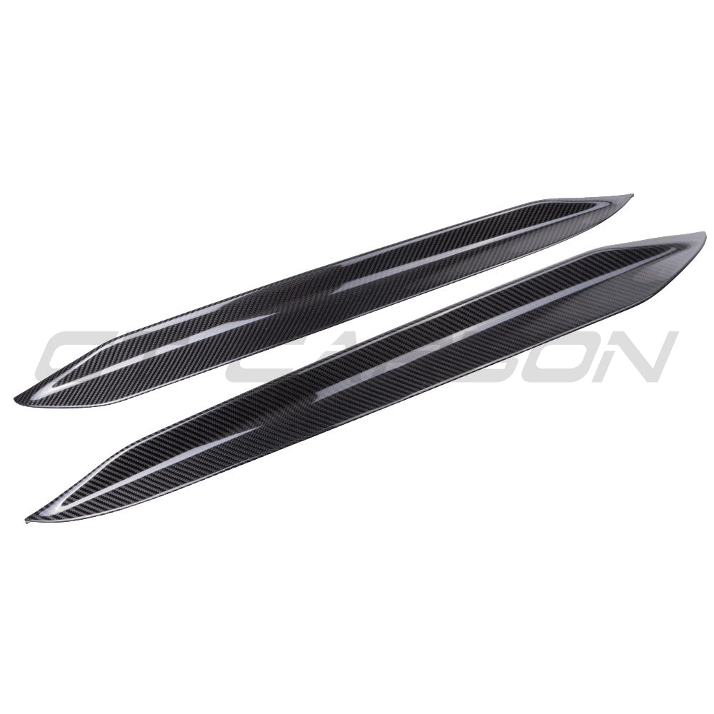 BMW X6/X6M G06 F96 2019+ carbon fibre rear window trims accessory by CT Carbon, close-up view of sleek, textured carbon finish.