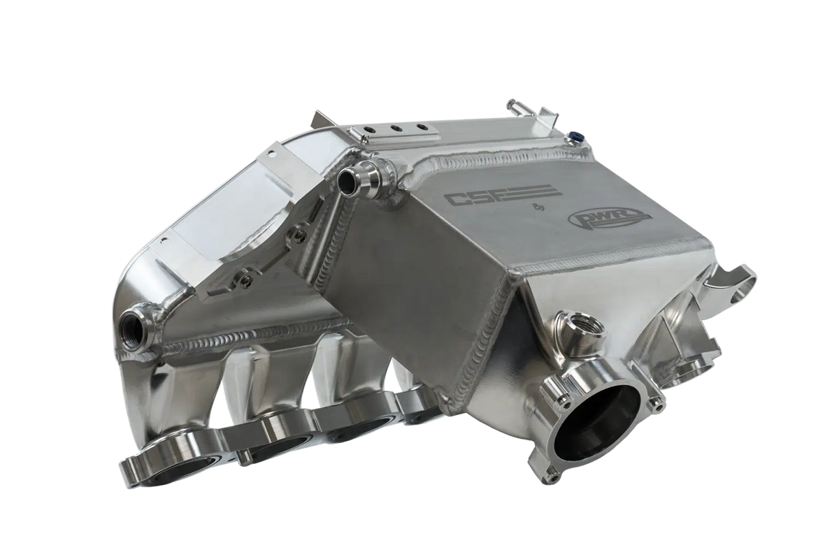 CSF Charge-Air Cooler manifold for G8X M3 and M4, high-performance intercooler with sleek design and detailed fins.