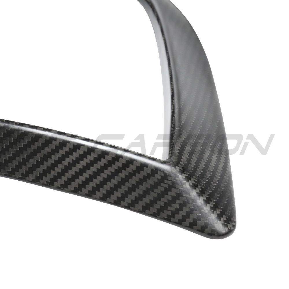 CT Carbon carbon fiber front bumper canards for Tesla Model 3 2017-2023, close-up view of aerodynamic car accessories.