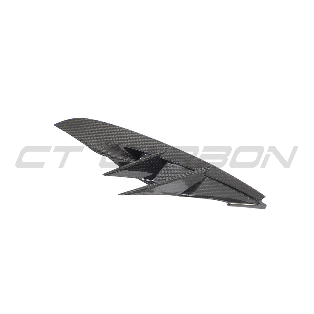 Carbon fiber front bumper vent trim for Toyota Supra 2019+ A90 by CT Carbon, showcasing sleek, lightweight automotive accessories.