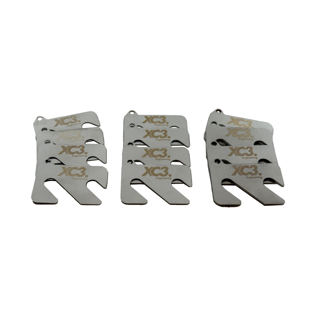 Porsche Cayman 718 GT4 GT4 RS front camber shim kit by XC3 Engineering for suspension and alignment adjustment.