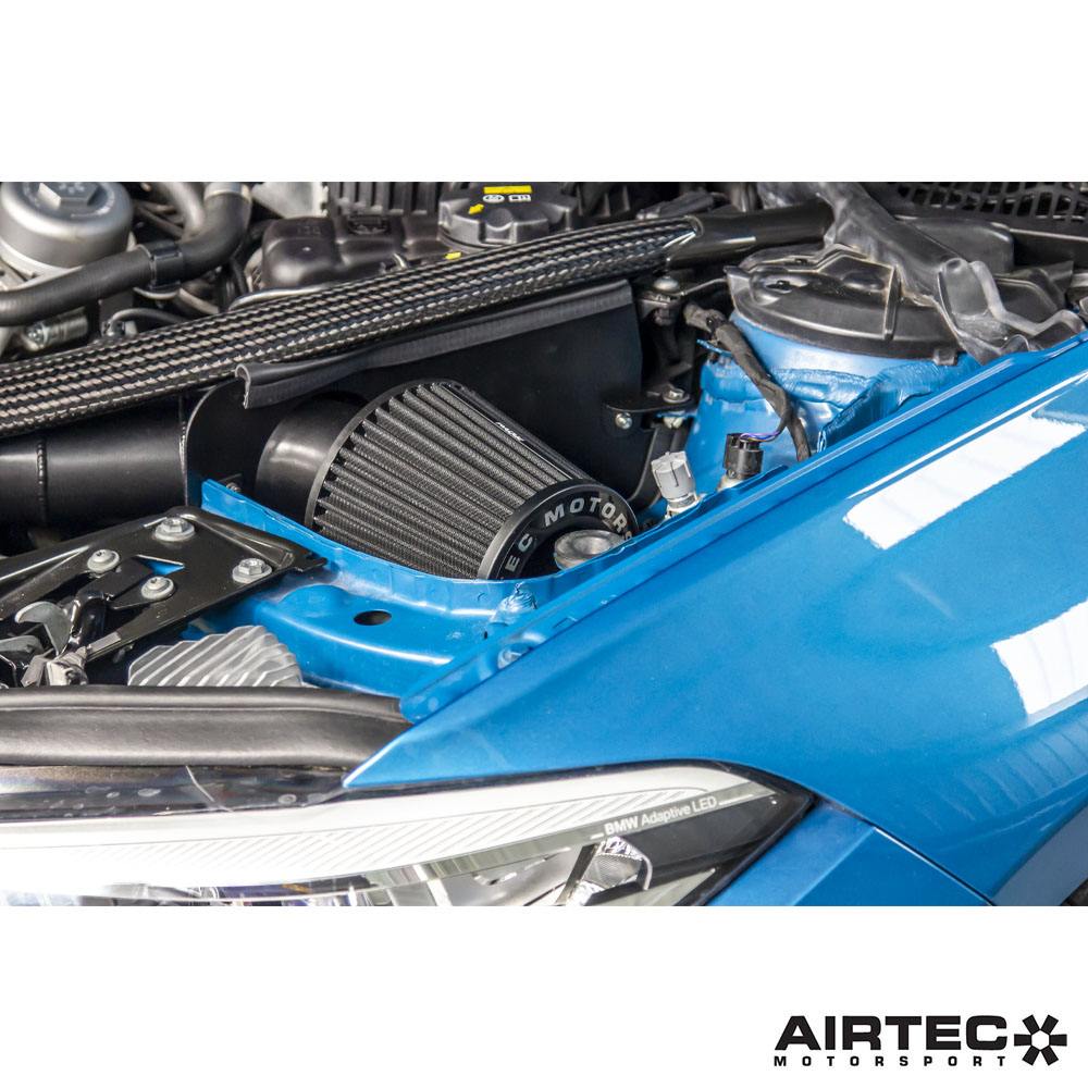 Airtec Motorsport induction kit installed in a BMW M3, showcasing the high-performance air intake system for enhanced engine airflow.
