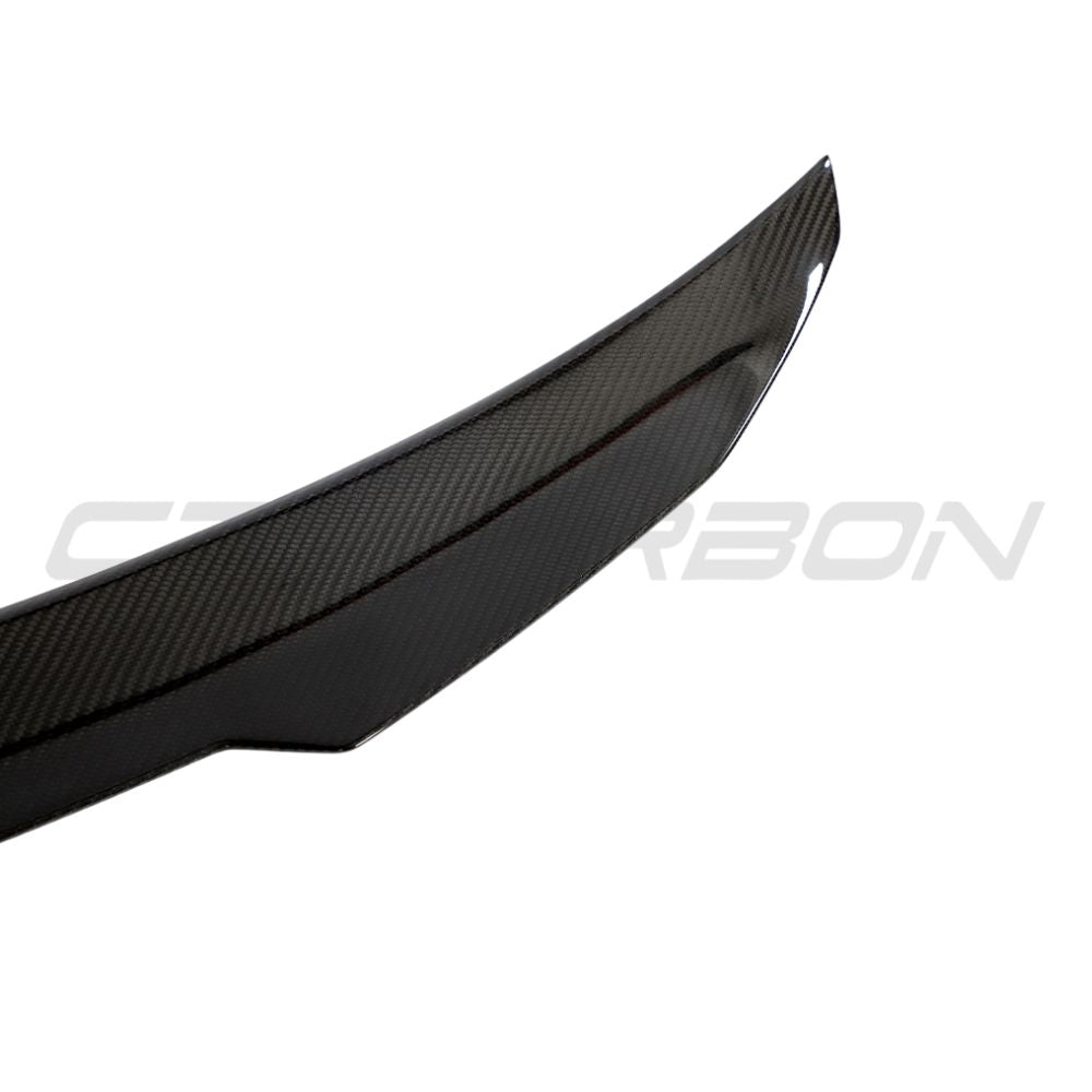 Carbon fiber spoiler for Audi A3, S3, RS3 8V sedan by CT Carbon, enhances sporty look from the rear view.