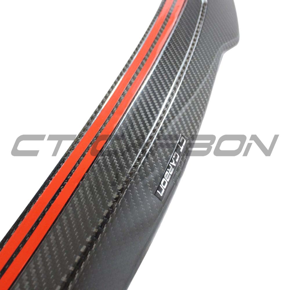 Audi A3/S3 8Y saloon full carbon fibre kit by CT Carbon, including spoiler and body panels in a sleek carbon fiber finish.