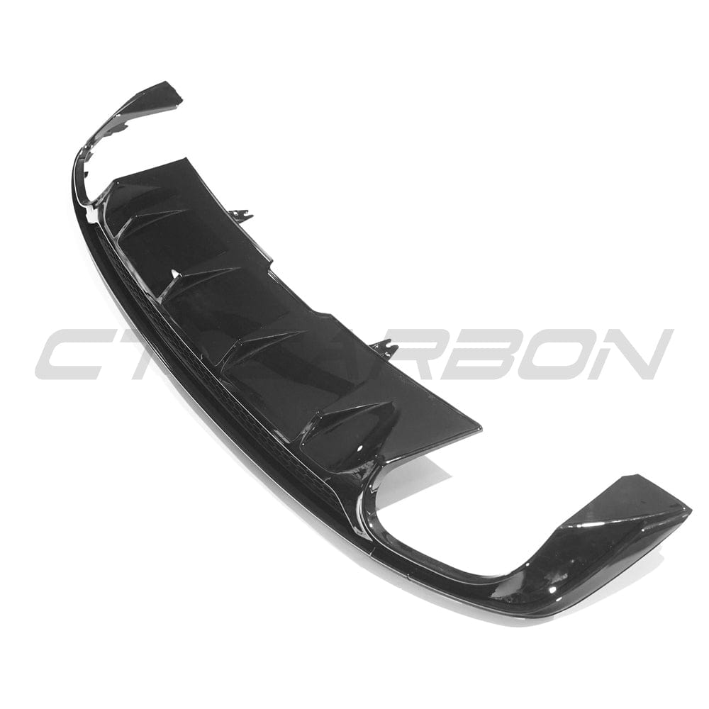 Gloss black diffuser for Audi A5/S5 B9 (2016-2019) by CT Carbon, showcasing the sleek, aerodynamic design of the aftermarket automotive part.