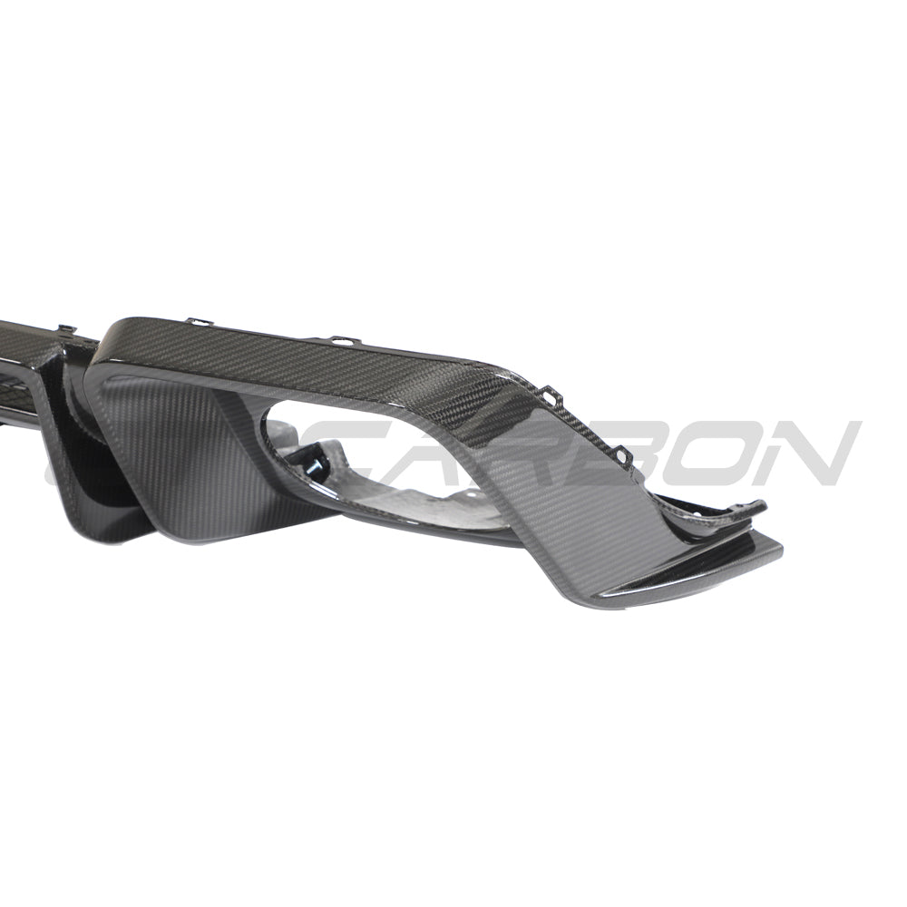 Carbon fiber diffuser for Audi R8 V10 Gen 2.5 by CT Carbon, showing detailed textured finish and aerodynamic design.
