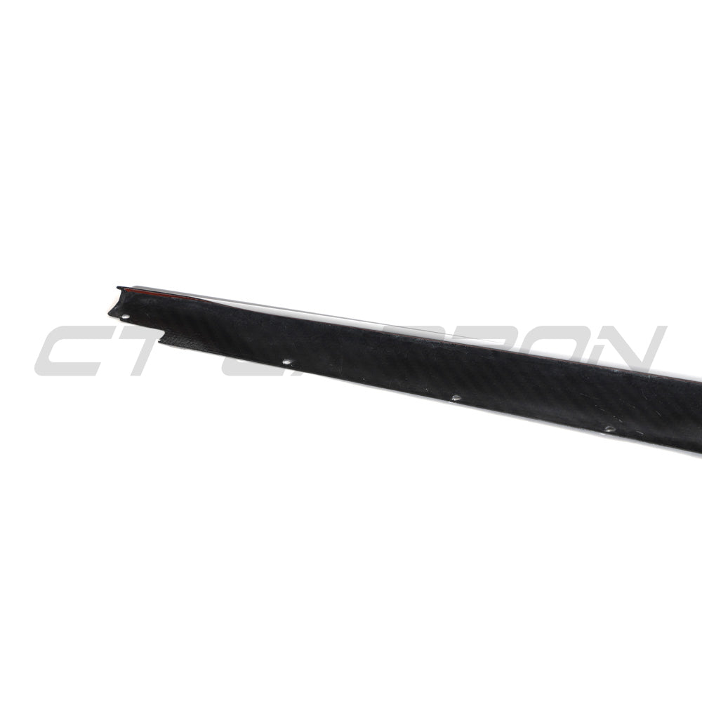 Audi R8 V10 Gen 2.5 carbon fibre side skirts by CT Carbon, showing sleek, lightweight aerodynamic car body enhancement.