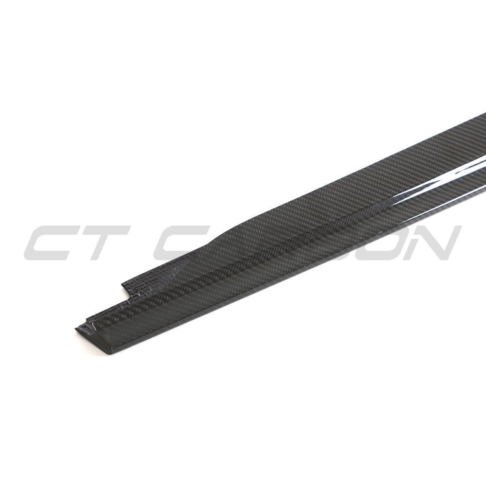 Audi R8 V10 Gen 2.5 carbon fibre side skirts by CT Carbon, showing sleek, lightweight automotive side skirt design.