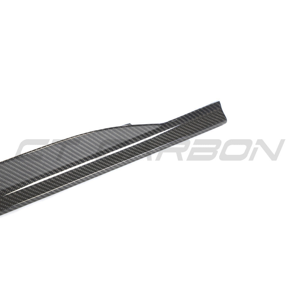 Audi R8 V10 Gen 2.5 carbon fiber side skirts by CT Carbon, showing sleek, lightweight side panels with a carbon fiber finish.