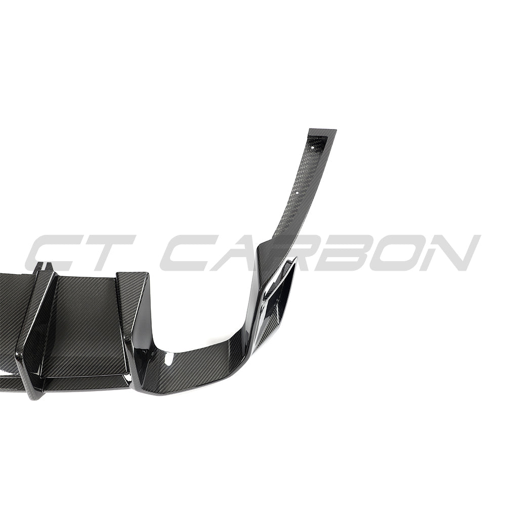 Carbon fiber diffuser for Audi RS4 B9 and B9.5 (2016-2024) by CT Carbon, showcasing the sleek, textured design.
