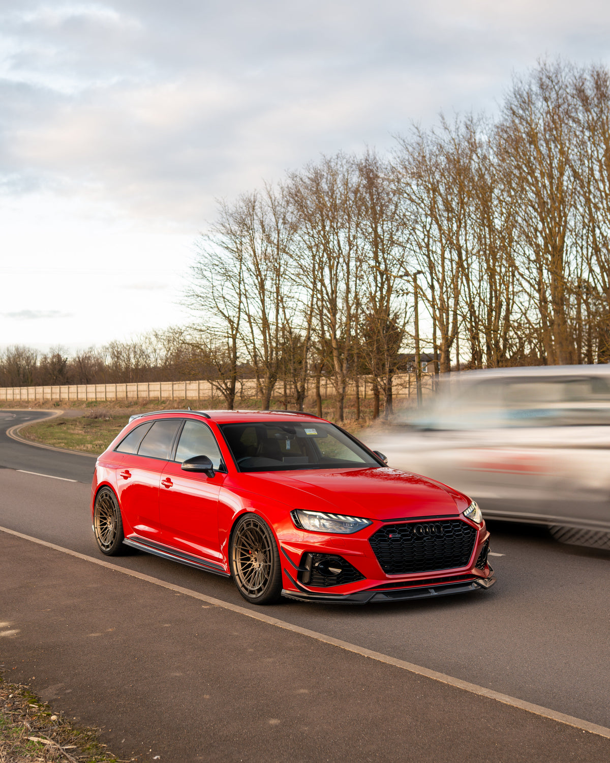 Audi RS4 B9.5 carbon fibre splitter by CT Carbon, showing sleek front split design with textured carbon fiber finish.