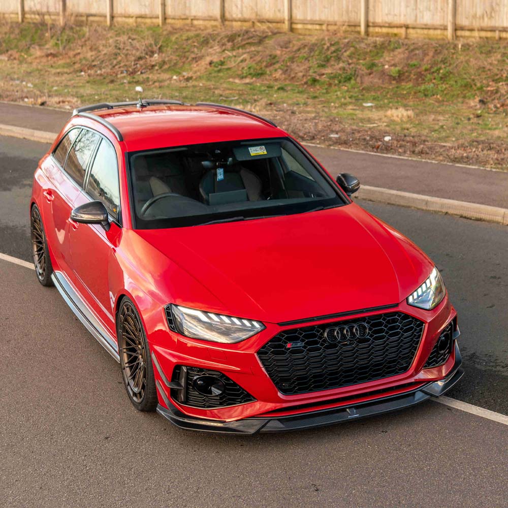 Audi RS4 B9.5 carbon fiber front canards by CT Design, automotive accessories, showing sleek, lightweight aerodynamic enhancements.