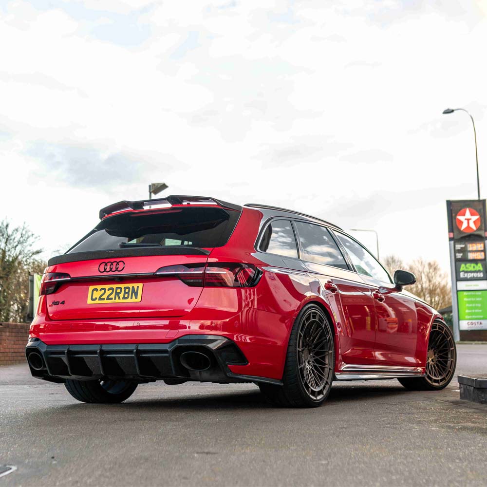 Carbon fiber middle spoiler for Audi A4/S4/RS4 B9 & 9.5 by CT Design, shown installed on the vehicle's rear trunk.