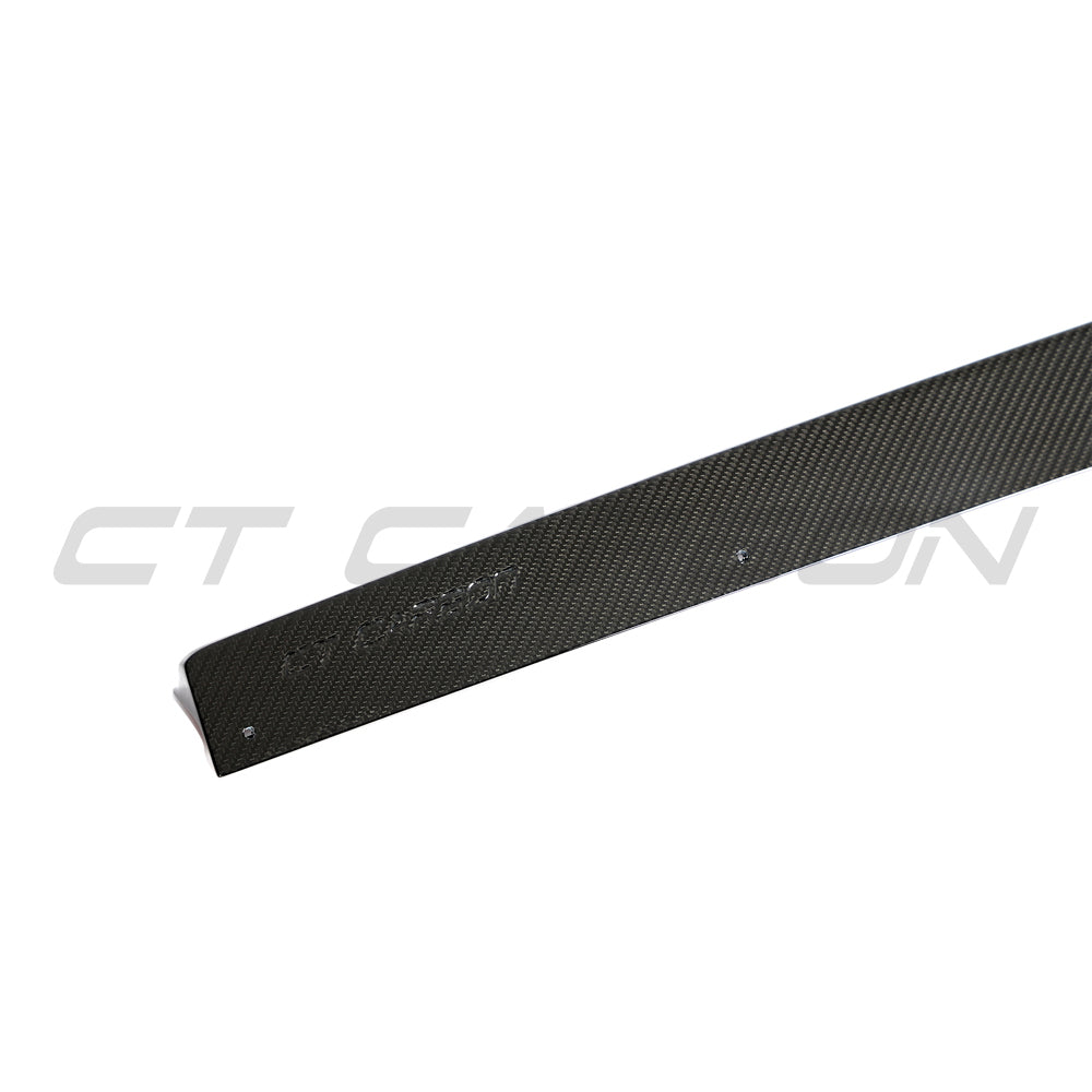 Audi RS4 B9.5 carbon fiber side skirts by CT Design, featuring sleek, lightweight aerodynamic enhancements on the car's sides.