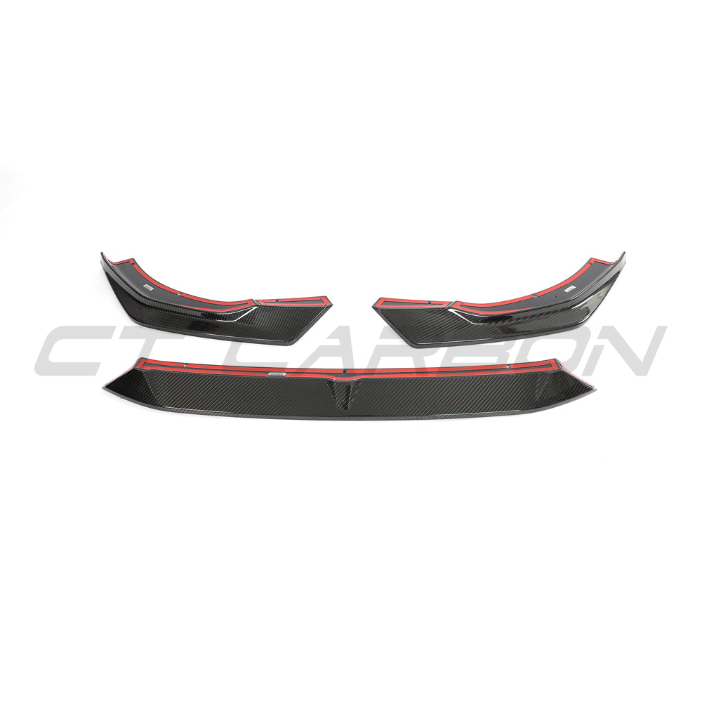 Carbon fibre splitter for Audi RS4 B9.5 by CT Carbon, showcasing the sleek aerodynamic design and textured carbon finish.