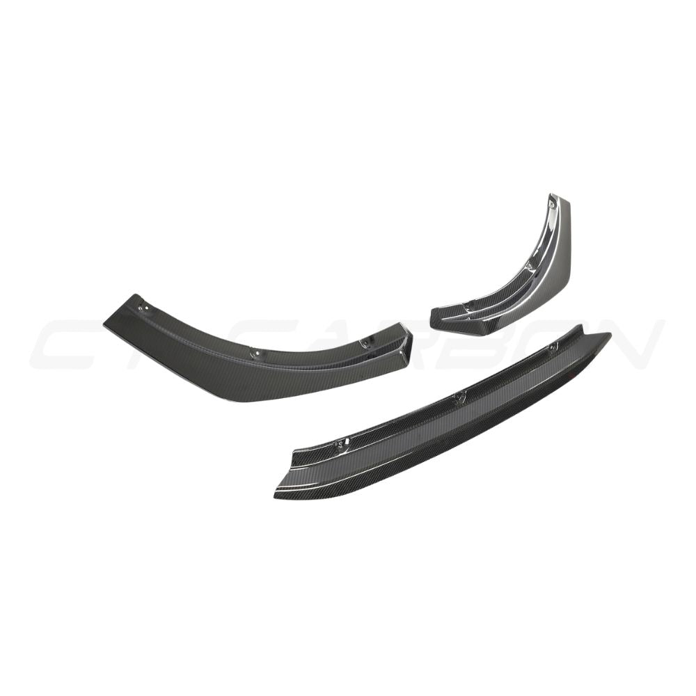 Audi RS4 B9.5 CT Design carbon fiber splitter installed on front bumper, showcasing lightweight, textured carbon fiber surface.