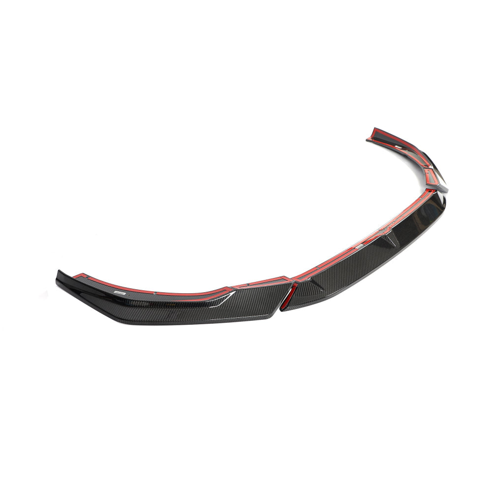 Audi RS4 B9.5 carbon fibre splitter by CT Carbon, showing sleek, lightweight aerodynamic design for enhanced vehicle performance.