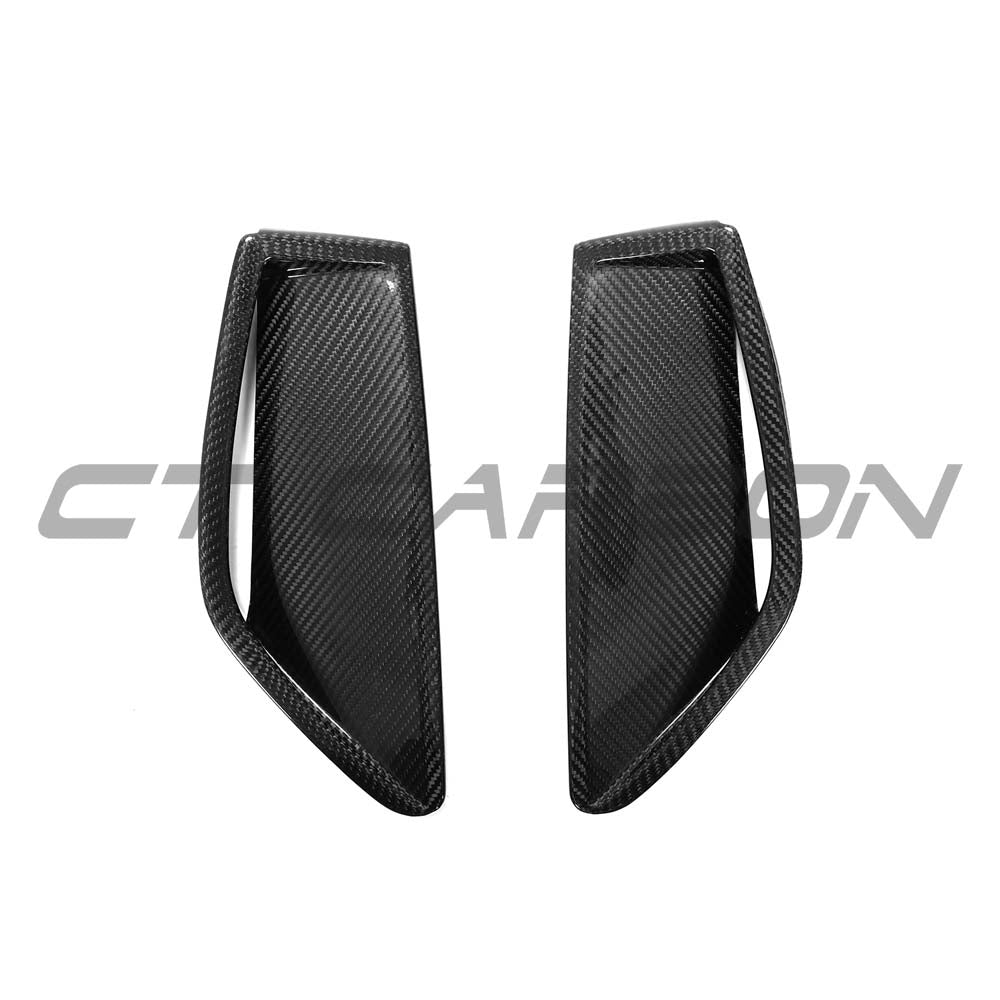 Audi RS6 C8 2019+ full carbon fibre front bumper vent trim kit by CT Carbon, showcasing sleek, lightweight carbon fiber design.
