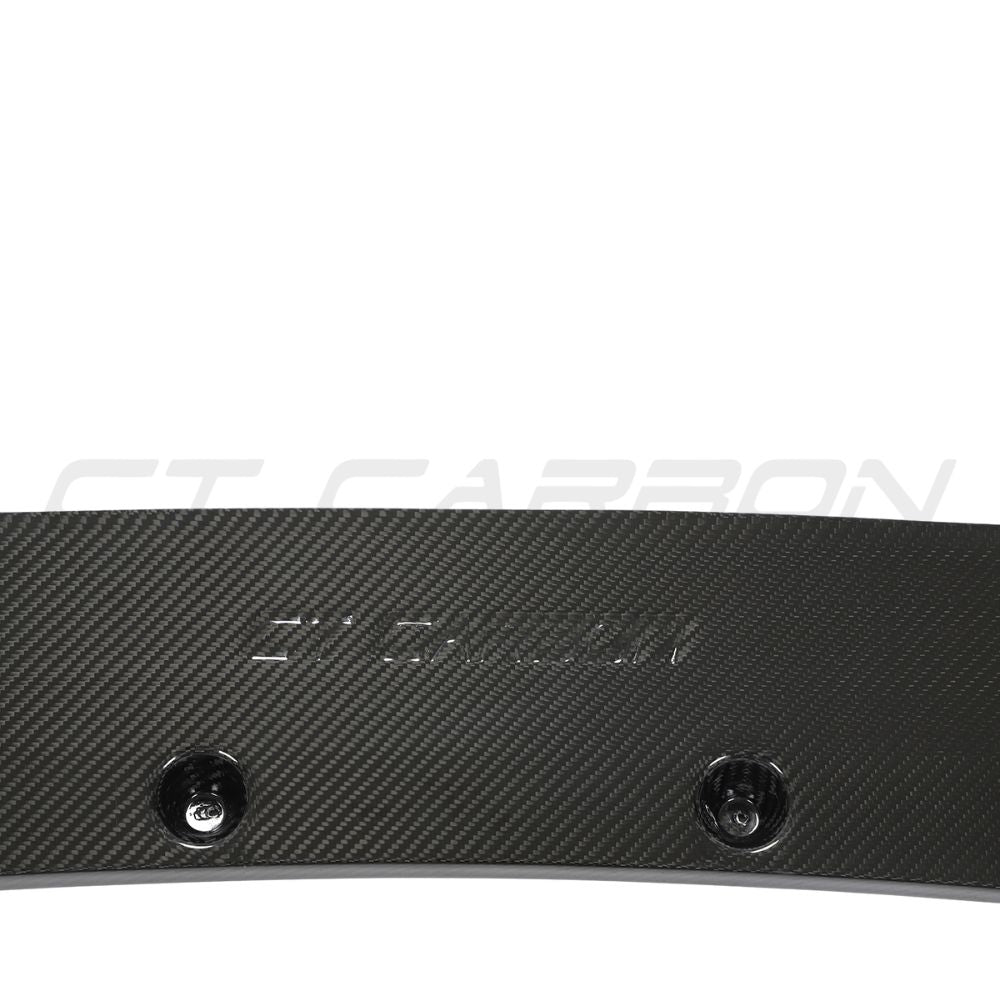 Audi RS6 C8 full carbon fibre kit by CT Design, featuring splitter and aerodynamic accents on the car's front and side panels.