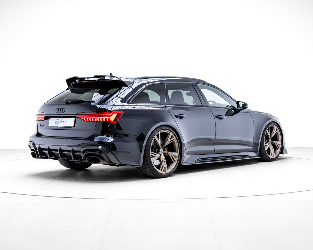Carbon fibre diffuser for Audi RS6 and RS7 C8 models by CT Carbon, showcasing sleek, aerodynamic design on the vehicle's rear.