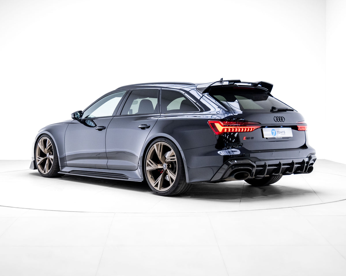 Audi RS6 RS7 C8 carbon fiber diffuser by CT Design installed on the rear of the vehicle, showcasing its sleek, high-performance design