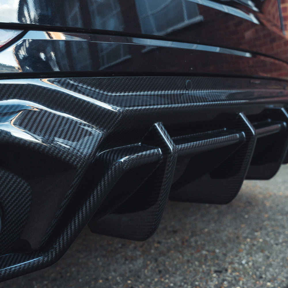 Audi RSQ8 2020-2024 pre-facelift carbon fibre diffuser by CT Design, showcasing sleek carbon fiber finish and aerodynamic design.