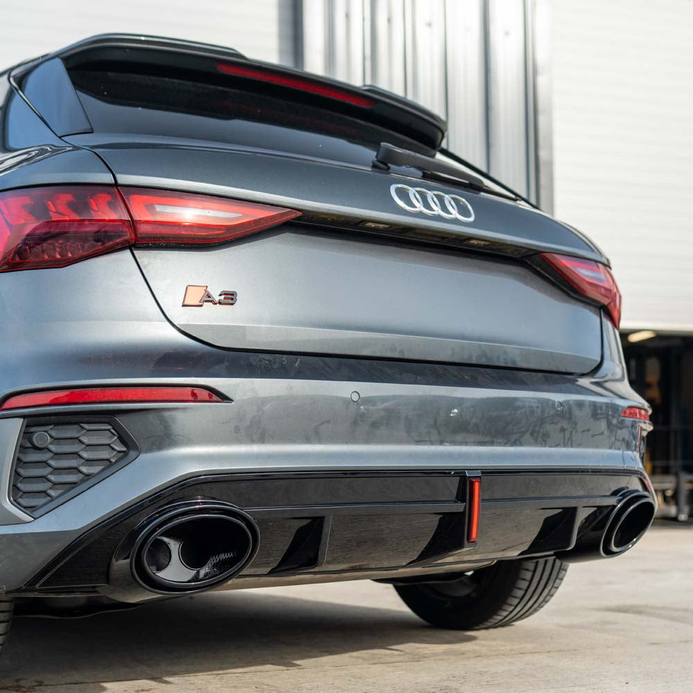 CT Carbon gloss black diffuser with exhaust tips and LED light for Audi S3/A3 8Y S-Line, designed for sporty rear styling.