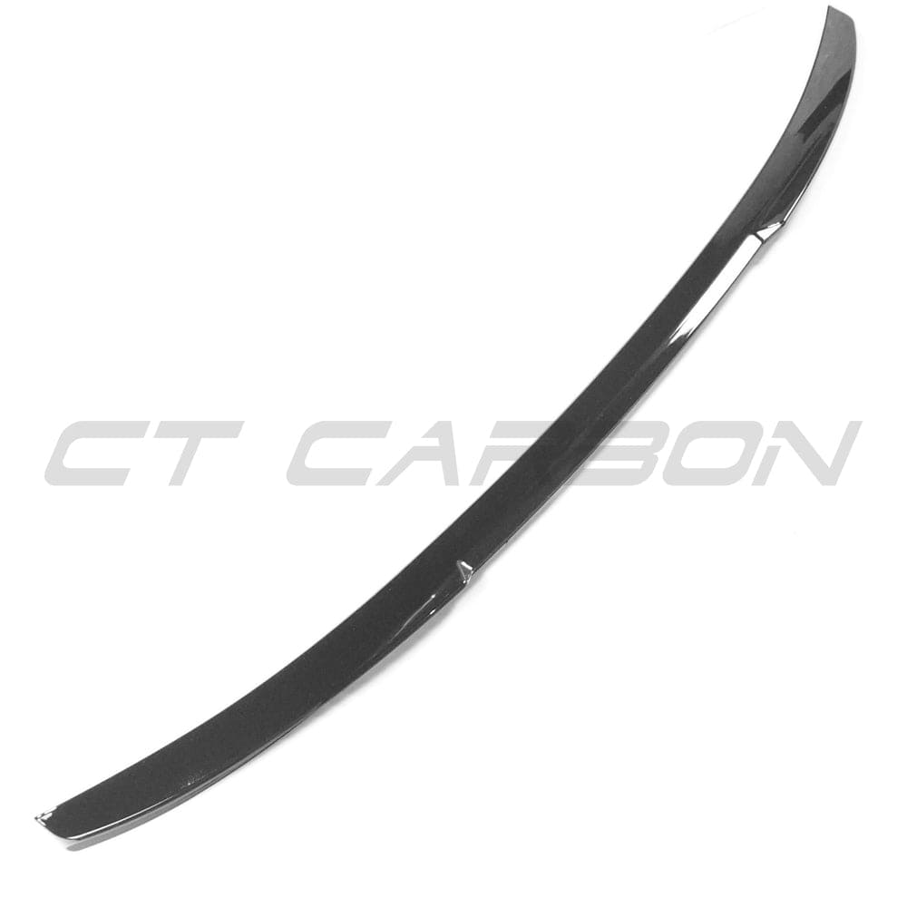 Gloss black Audi S3/A3 8Y S-line saloon spoiler by CT Carbon, M4 style, shown on the vehicle in a close-up image.