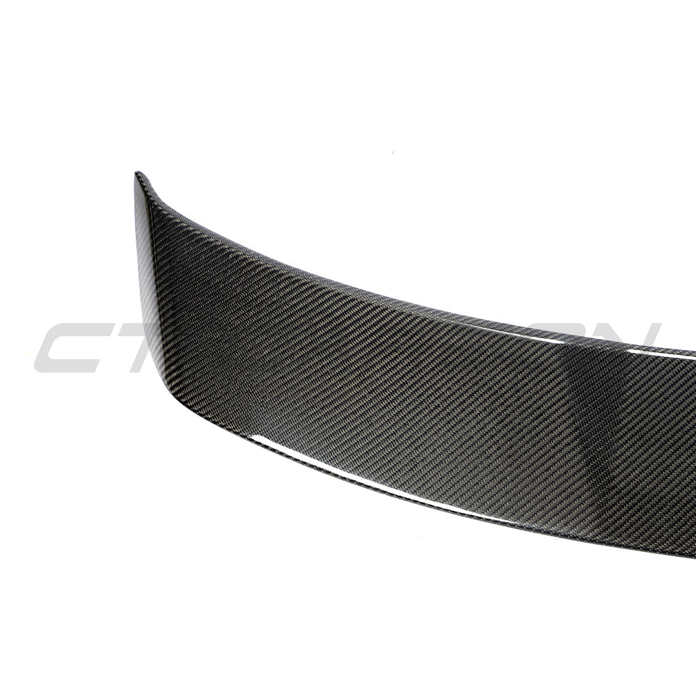 Audi TT/TTS Quattro MK3 carbon fibre spoiler by CT Carbon, showing the sleek, aerodynamic wing design on the vehicle.