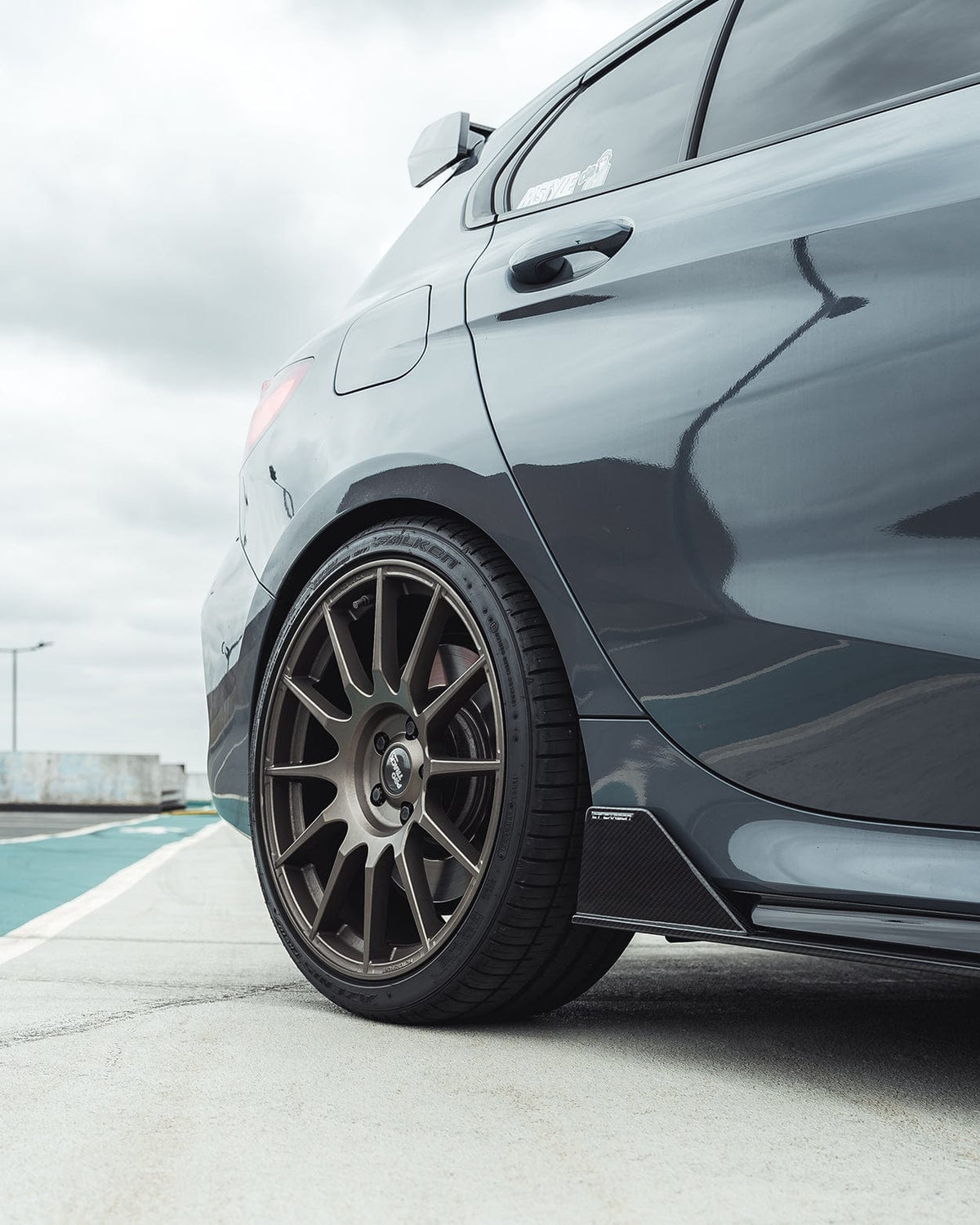 BMW 1 Series F40 carbon fibre side skirts by CT Design, showcasing sleek, lightweight aerodynamic enhancements for the vehicle.