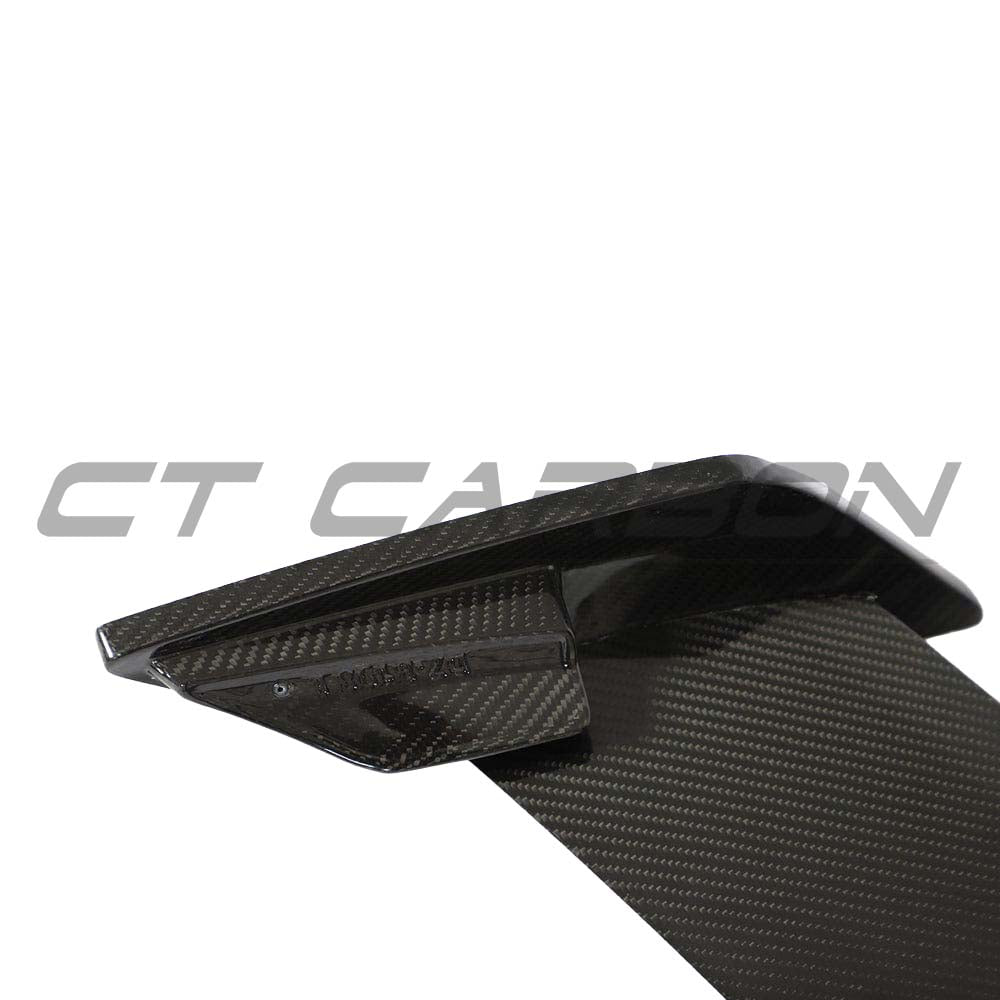 BMW 1 Series F40 and F70 carbon fibre wing spoiler by CT Design, showcasing the sleek, aerodynamic design and carbon finish.