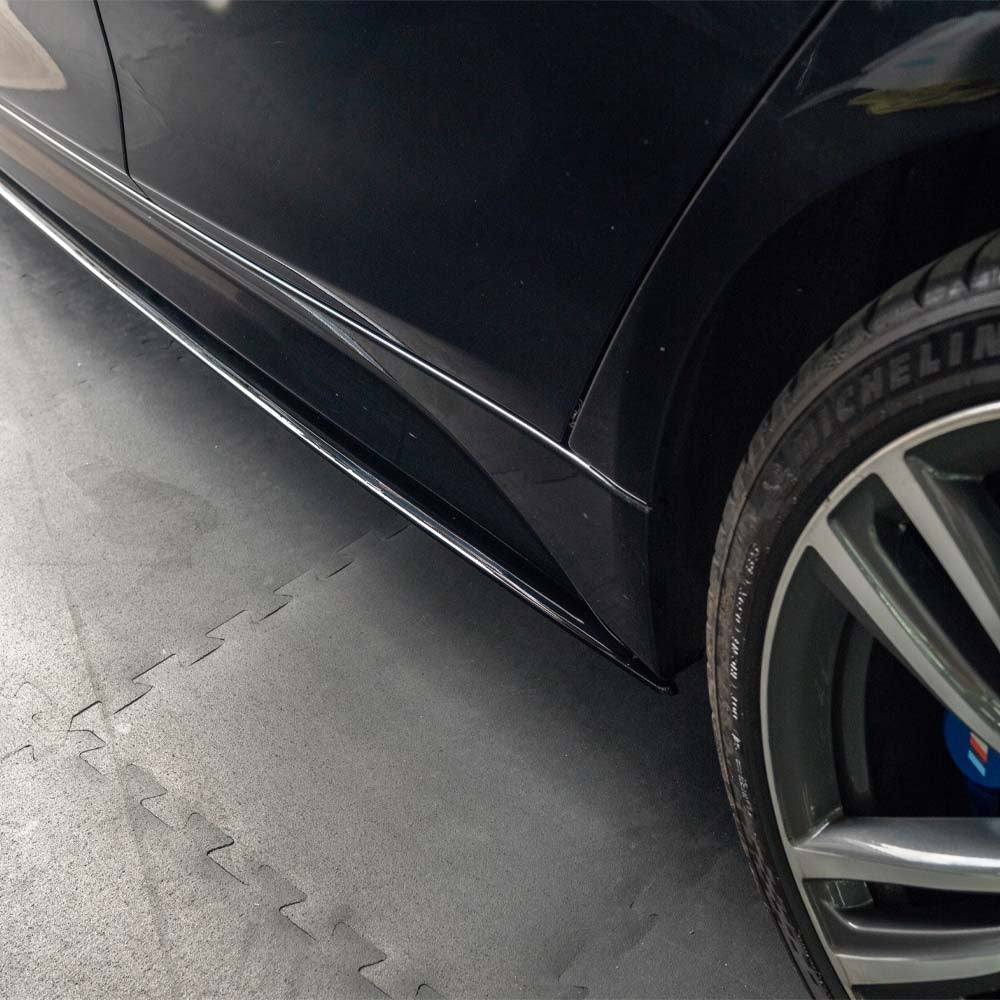 BMW 3 Series F30/F31 GLOSS BLACK side skirts by CT Carbon, V2 style, featuring sleek aerodynamic design for sporty appearance.