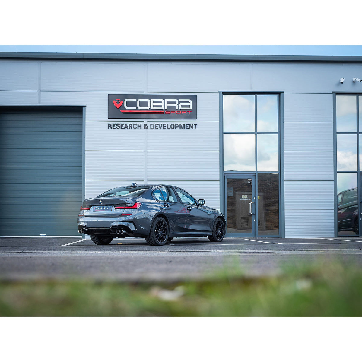 Cobra Sport BMW 330e G20 quad exit valved dual rear axle back performance exhaust system on GPF/OPF model.