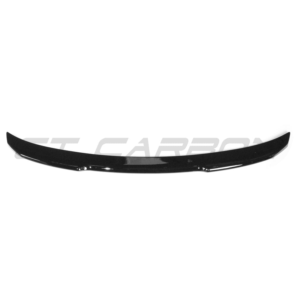 BMW 4 Series F32 gloss black V6 spoiler by CT Carbon, showcasing sleek aerodynamic design on a sporty coupe.