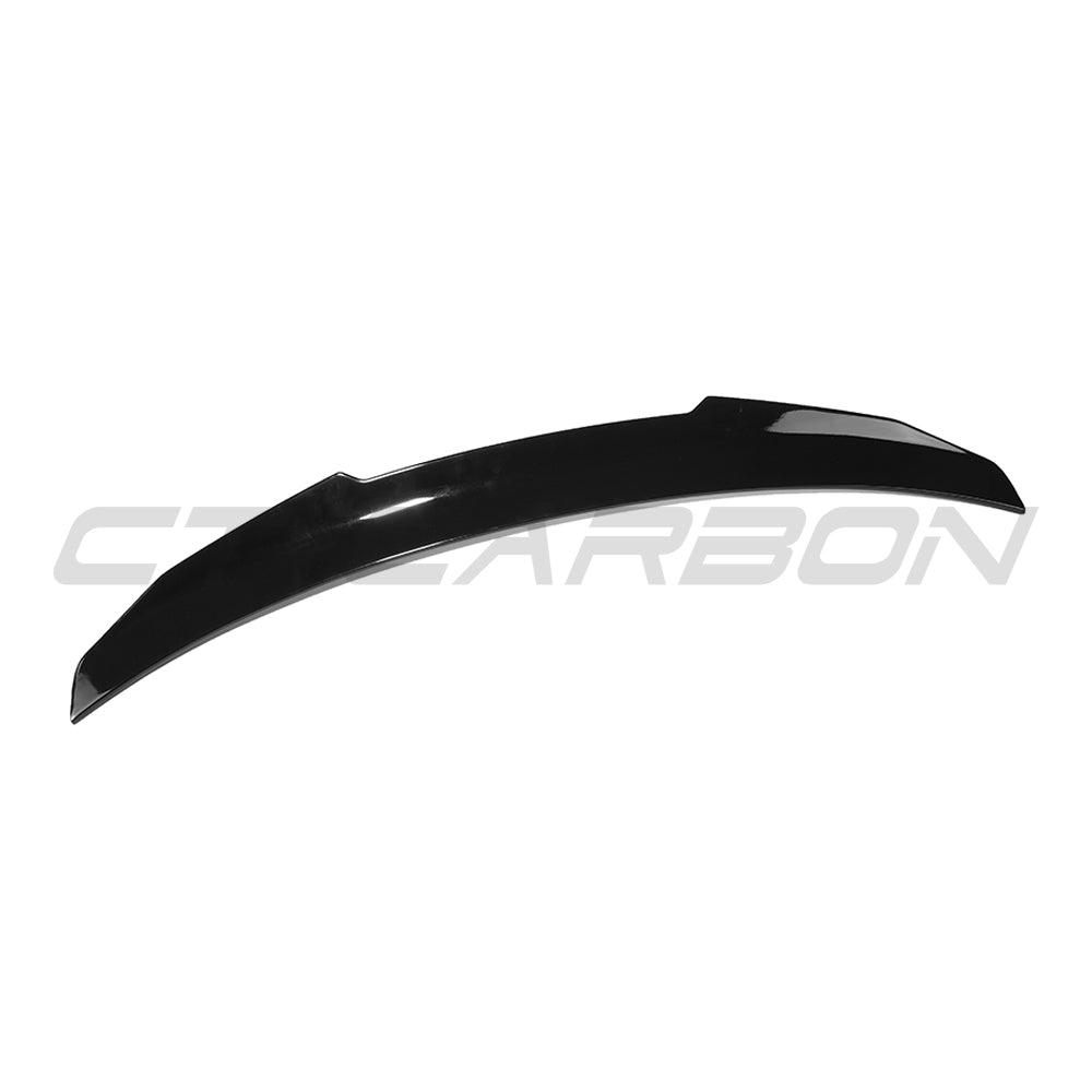 BMW 4 Series G22 gloss black spoiler by CT Carbon, V2, showing the sleek aerodynamic design on a sporty coupe.