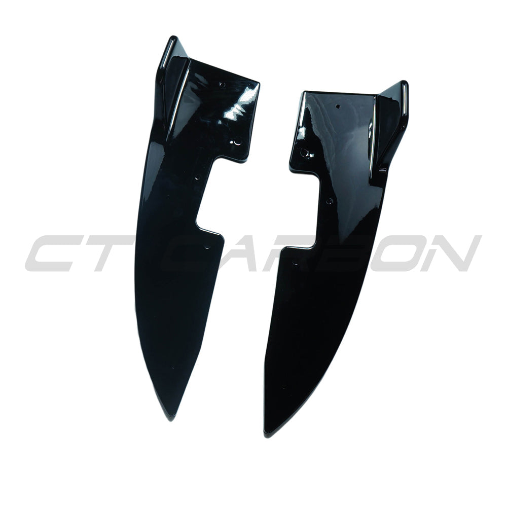 BMW 4 Series G22 G23 2020+ gloss black rear bumper corners by CT Carbon, close-up of sleek automotive accessory.