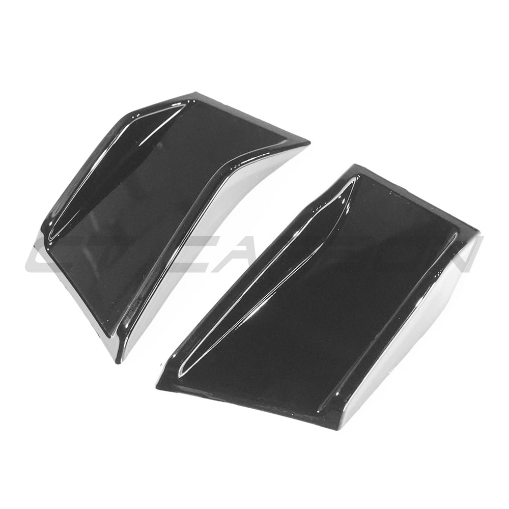 BMW 4 Series G22 G23 gloss black vent accessories by CT Carbon, showing close-up of sleek black vent covers on the vehicle.