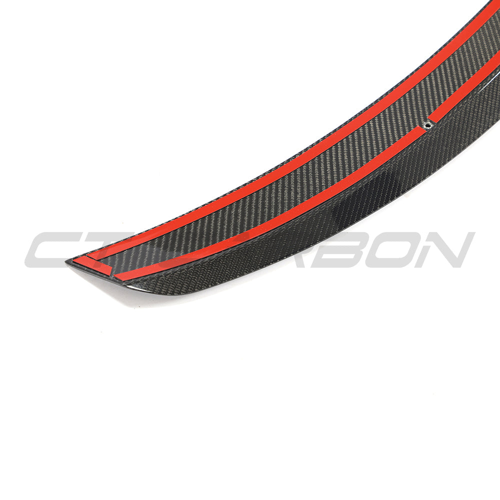 BMW 4 Series G26 and i4 carbon fibre spoiler by CT Carbon, M style, showcasing sleek aerodynamic design.