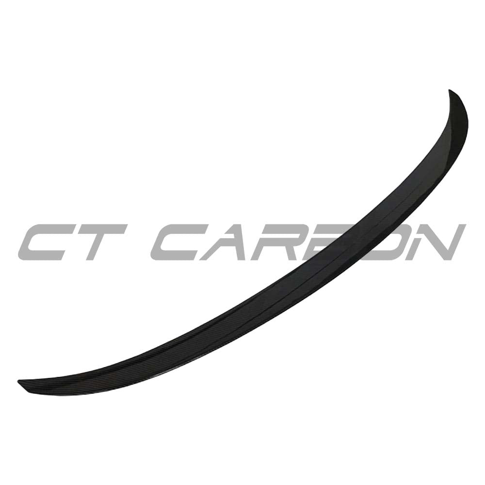 BMW 5 Series G30 gloss black full kit by CT Carbon, including exterior parts with a sleek, matte black finish.