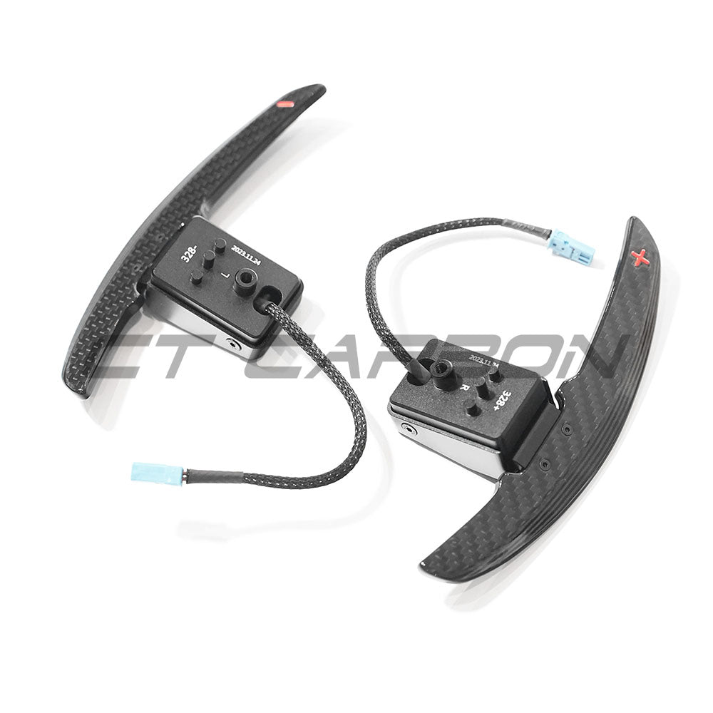 BMW carbon fiber magnetic shifter paddles by CT Carbon, sleek and lightweight automotive accessories for enhanced driving style.