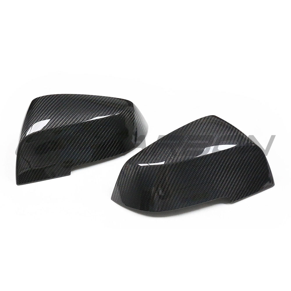BMW Fxx series dry carbon mirror replacement by CT Carbon, showcasing sleek, lightweight side mirror with carbon finish.
