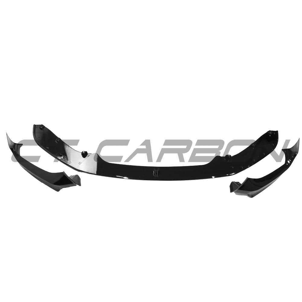 BMW F20/F21 1 Series LCI gloss black splitter by CT Carbon, showing the aerodynamic front splitter on the vehicle's lower front bumper.