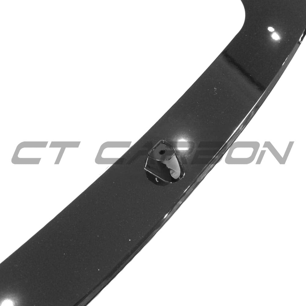 BMW F20/F21 1 Series LCI gloss black splitter by CT Carbon, shown on car front with sleek aerodynamic design.