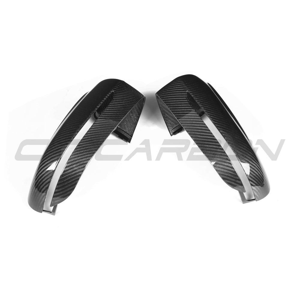 BMW F90 M5 2018-2023 pre-preg carbon fibre side mirrors from CT Carbon, left-hand drive only, close-up of mirror housing.